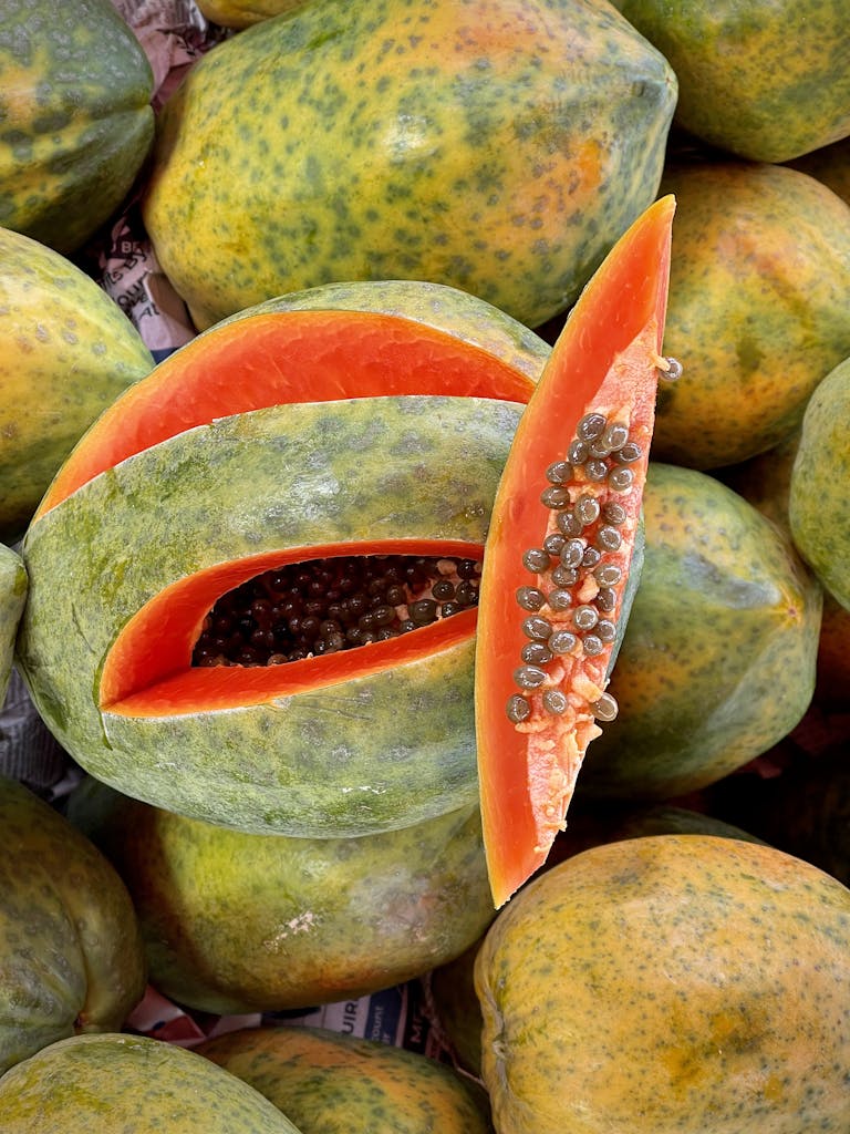 Close-up of Fresh Papayas with Juicy Orange Flesh